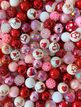Load image into Gallery viewer, Assorted Valentine-themed bubblegum beads with hearts and 'I love you' text on a colorful background.